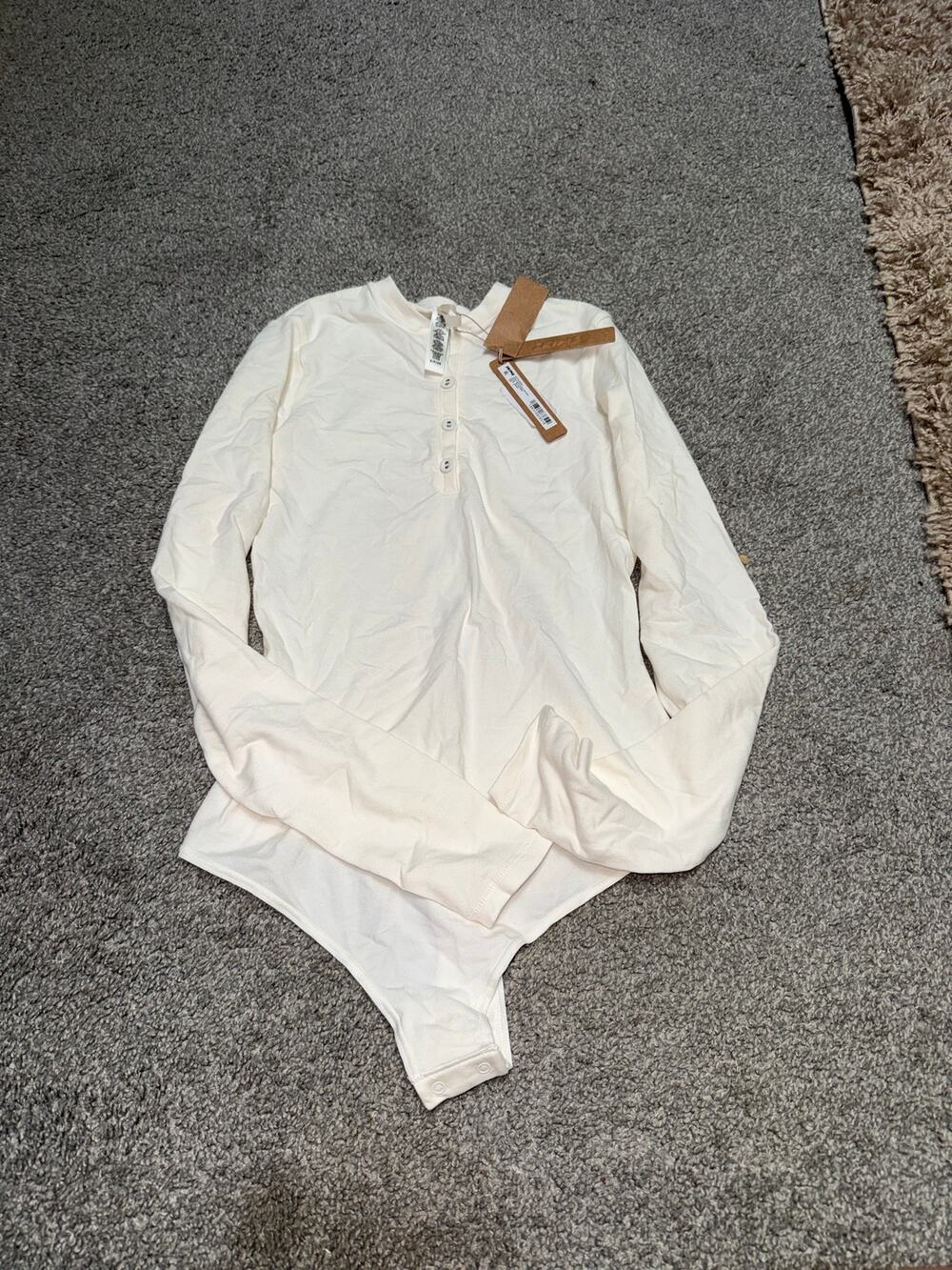 SKIMS cotton jersey long sleeve henley bodysuit in marble size small - NEW